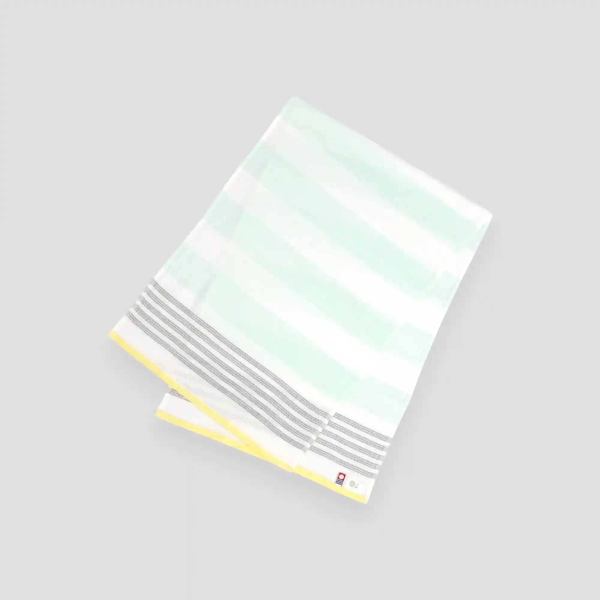 A green and yellow colors striped Imabari towel wash cloths