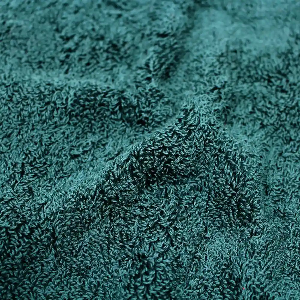 Close-up of a fabric of green Imabari towel made of cotton.