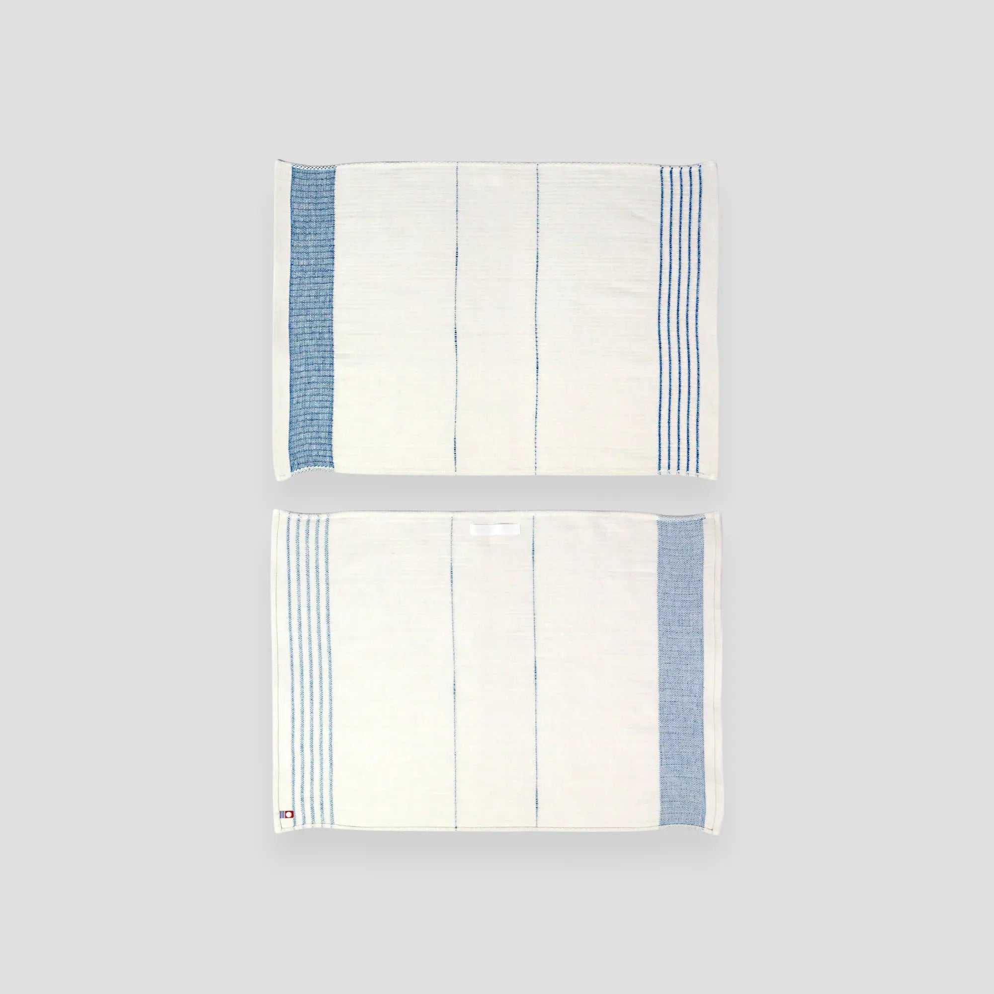 A set of FU-KU cotton Imabari towel linen kitchen cloths in blue color displayed