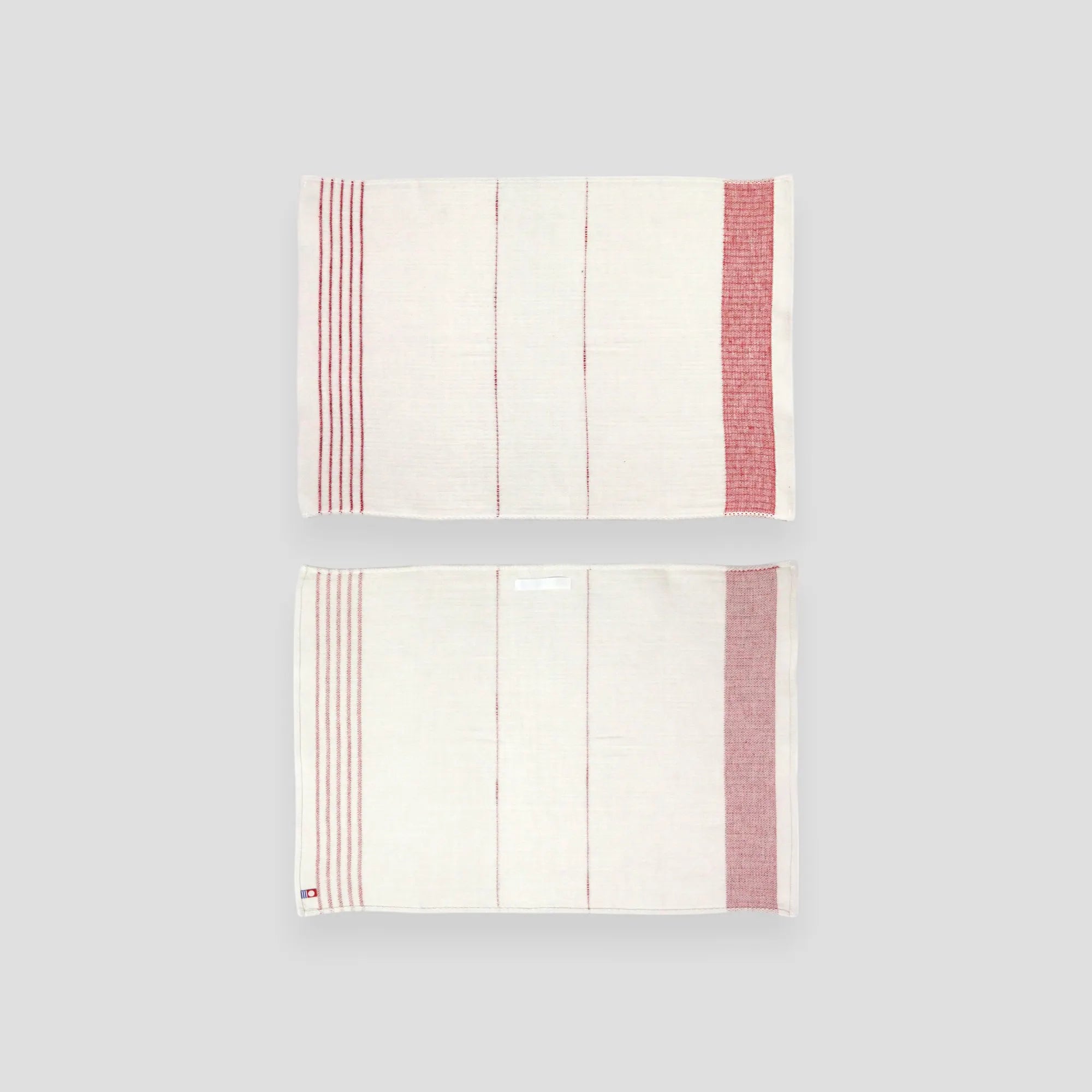 A set of FU-KU cotton Imabari towel linen kitchen cloths in red colors displayed