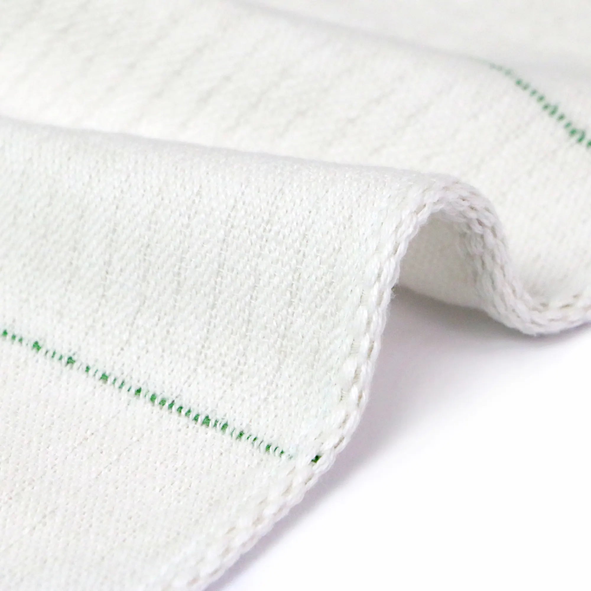 Close-up a side of Imabari towel linen kitchen cloth in green line