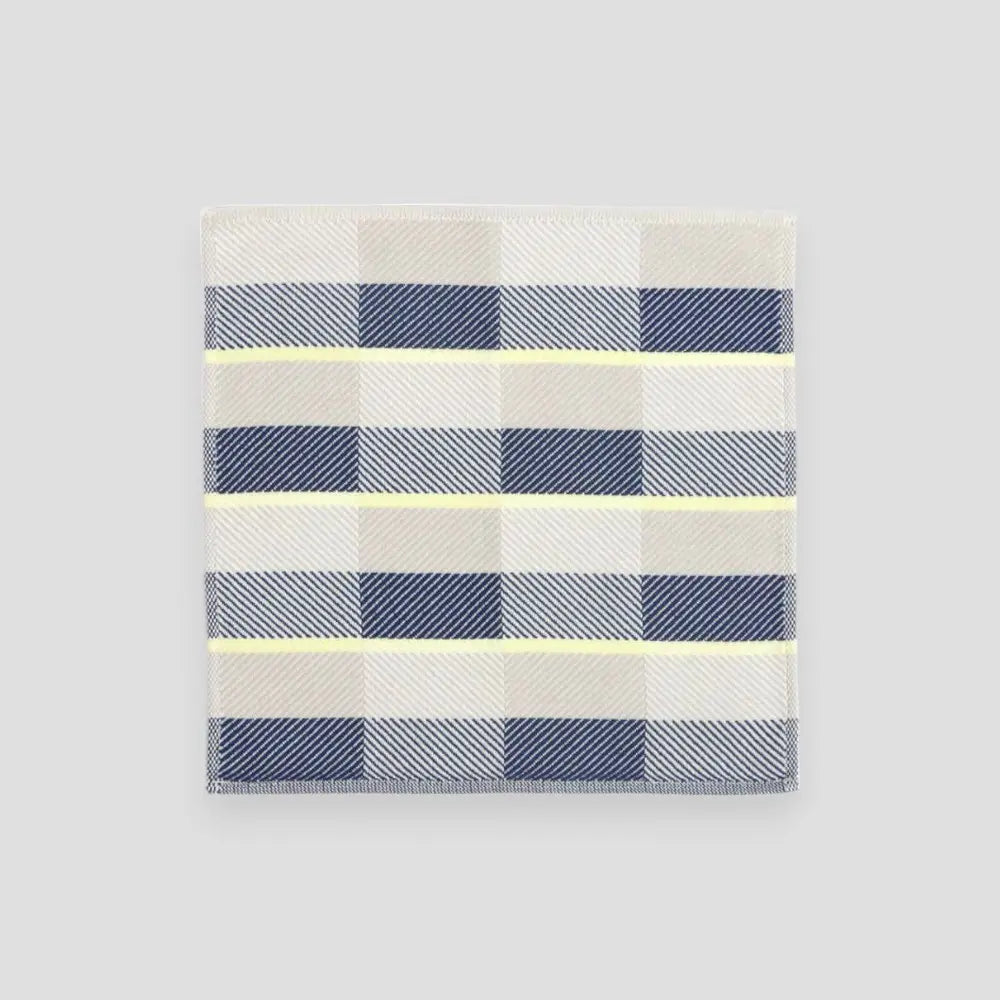Small Imabari towels in navy, beige, and yellow displayed