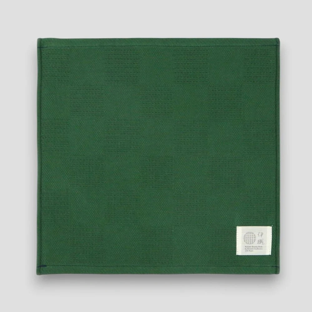 Green "Non-Pile" Imabari towel on a light gray background