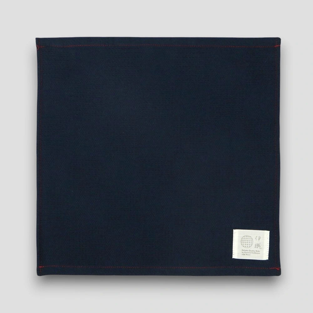 Navy "Non-Pile" Imabari towel on a light gray background