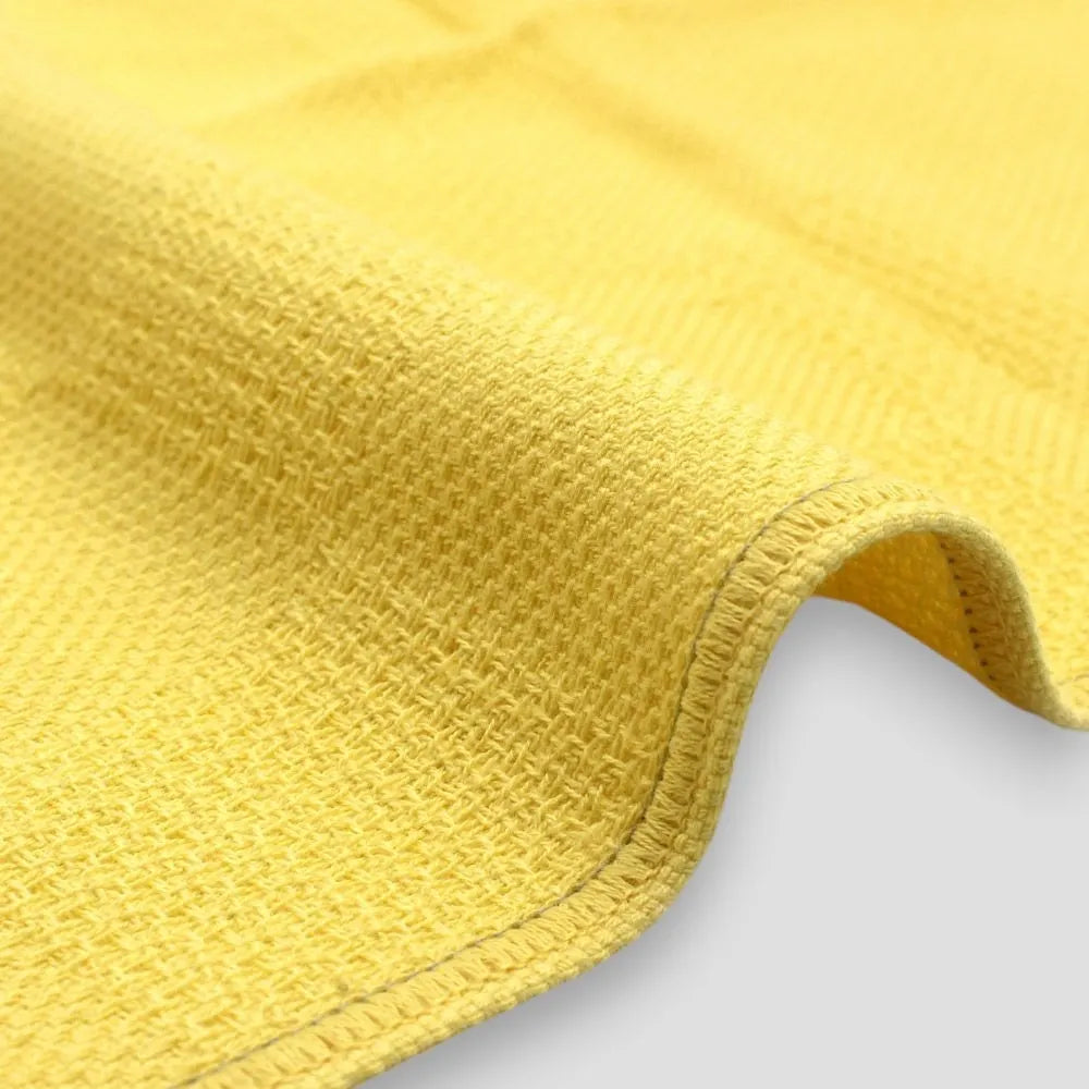 Close-up of a side of "Non-Pile" yellow Imabari towels