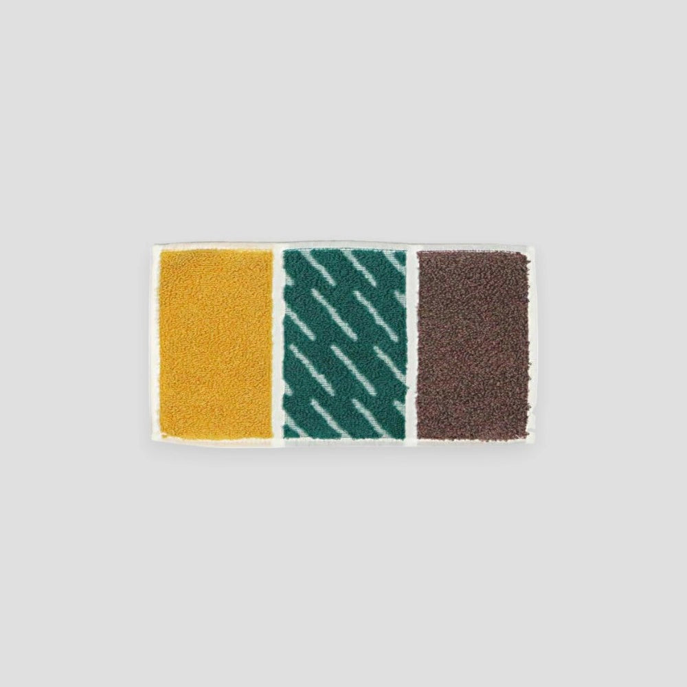 Colorful RHYTHM series tri-fold mini Imabari towel displayed on a white background.