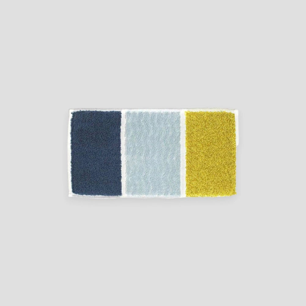 Colorful RHYTHM series tri-fold mini Imabari towel displayed on a white background.