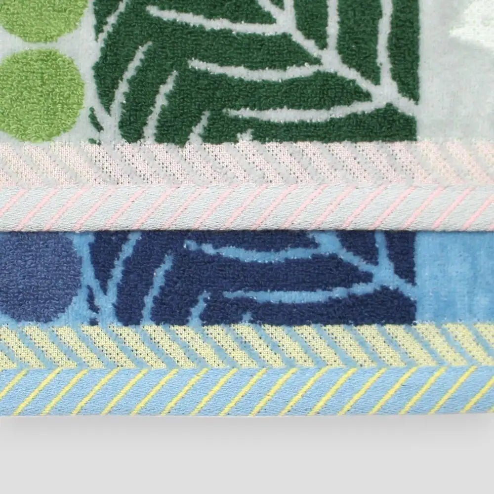 Close-up of hem of Imabari towels with green and blue pattern