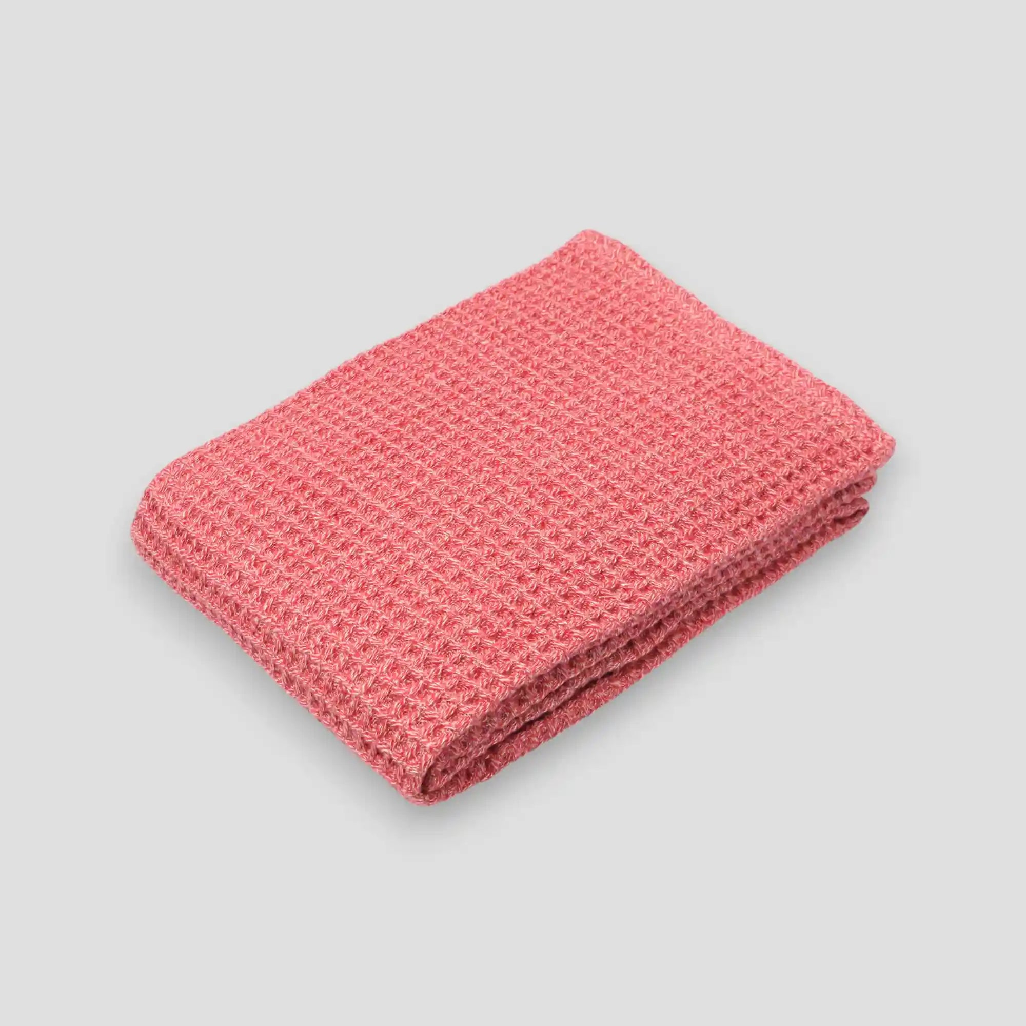 Red waffle Imabari towel on a gray background