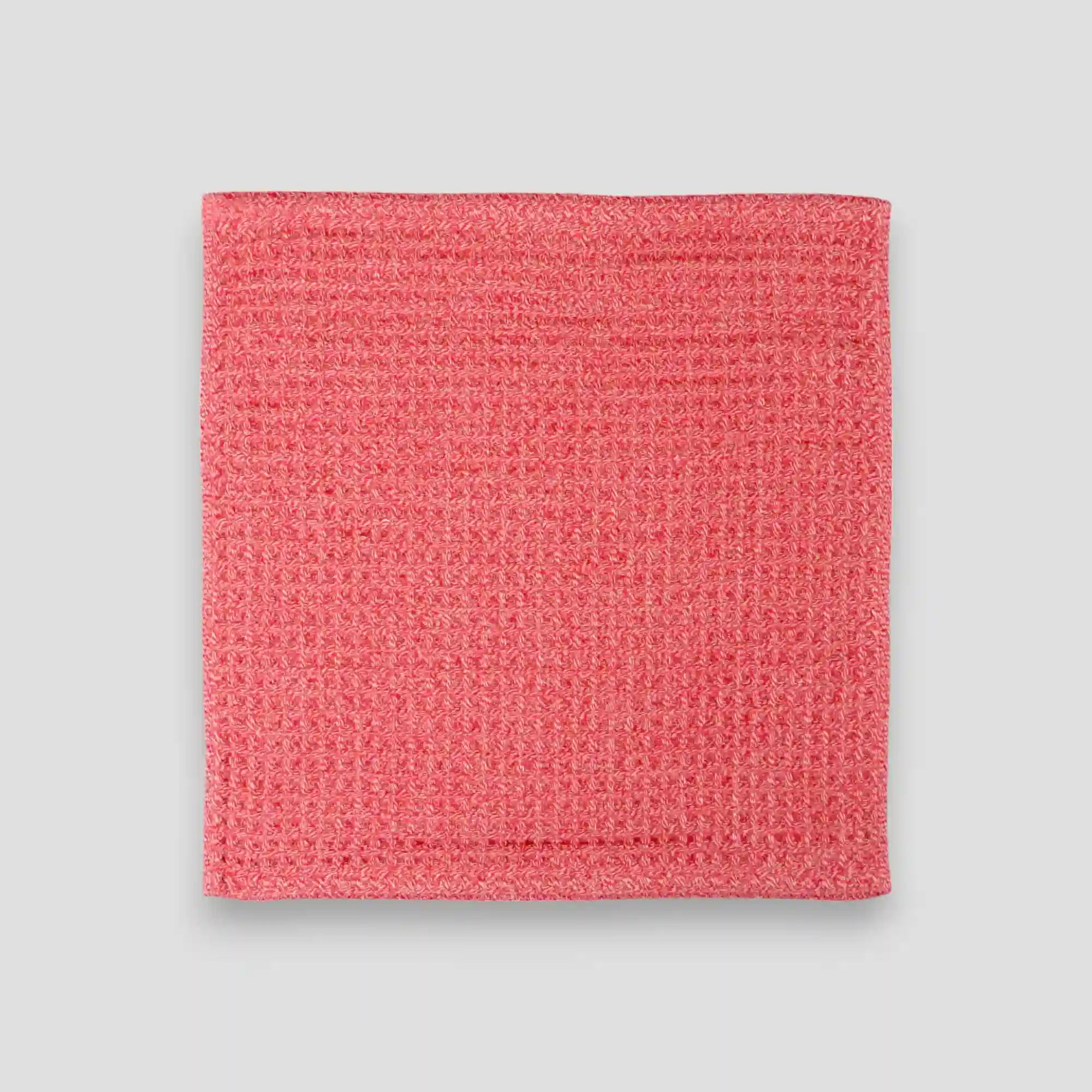 Red waffle Imabari towel on a gray background