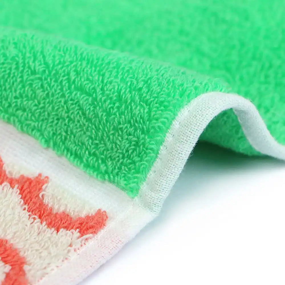 Close up of a side of a compact Imabari towel in vibrant patterns