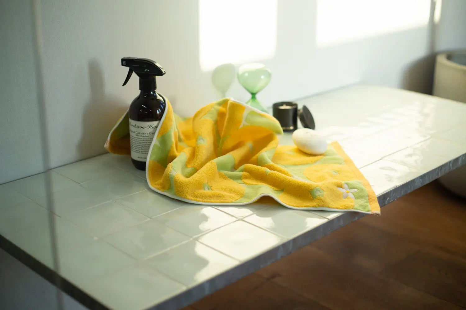 A colorful Imabari towel leave on the stone table with soap