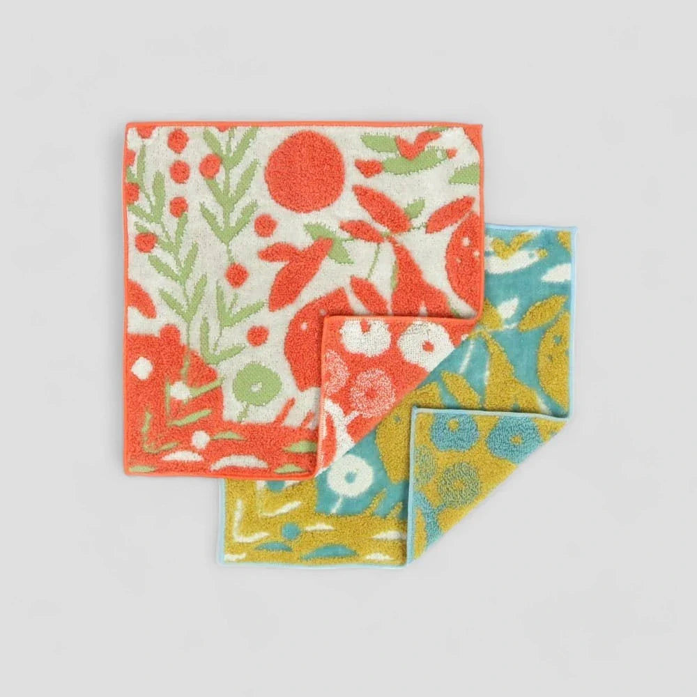 Two small Imabari towels with orange, yellow and blue tone multiple pattern