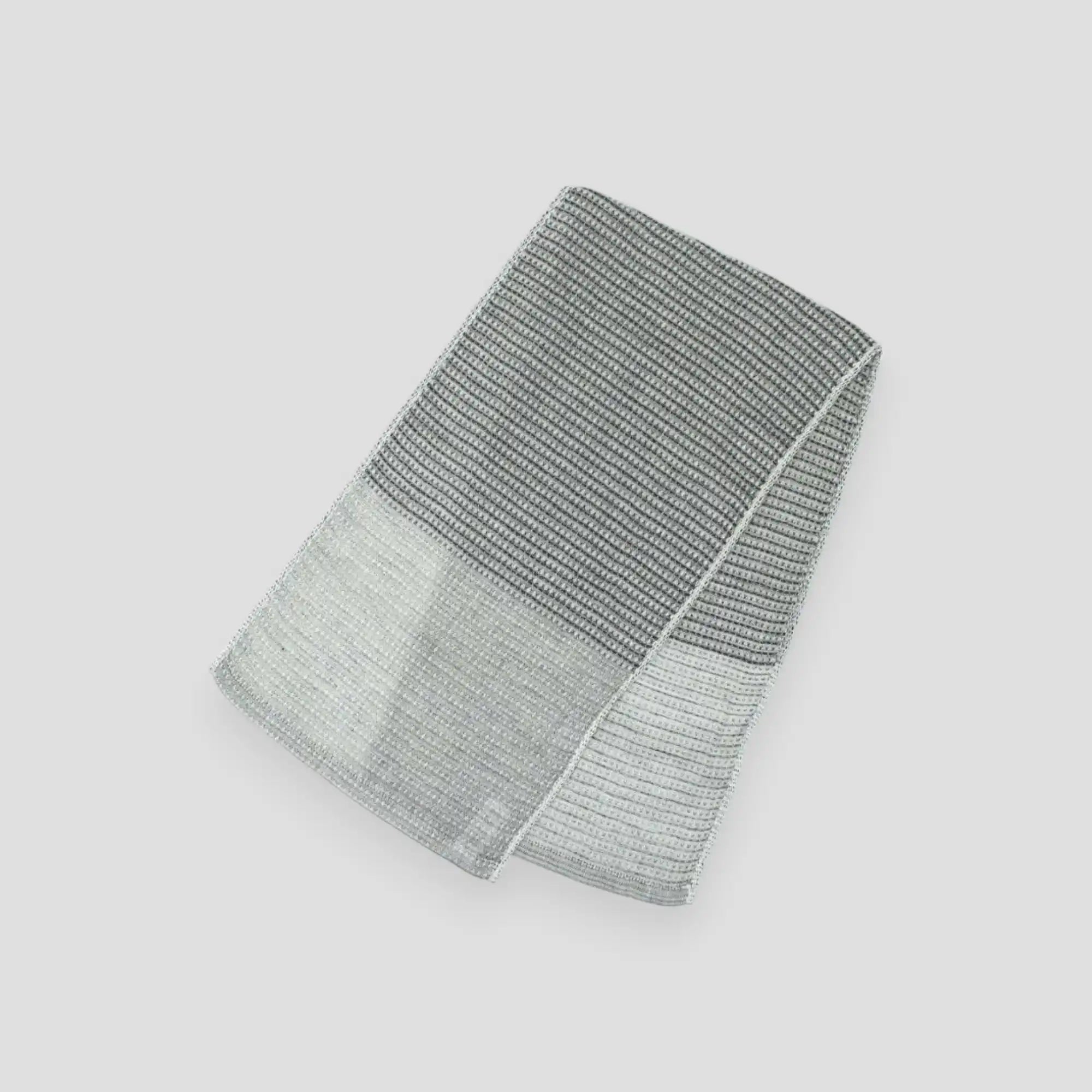 Folded in half of Bincho Charcoal-infused Imabari towel laid flat.