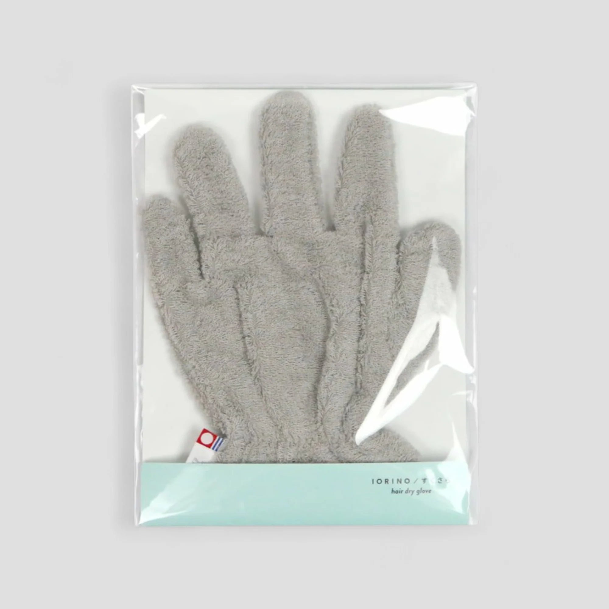 Packaged gray Imabari towel hair-dry- glove with a visible brand label on a light gray background