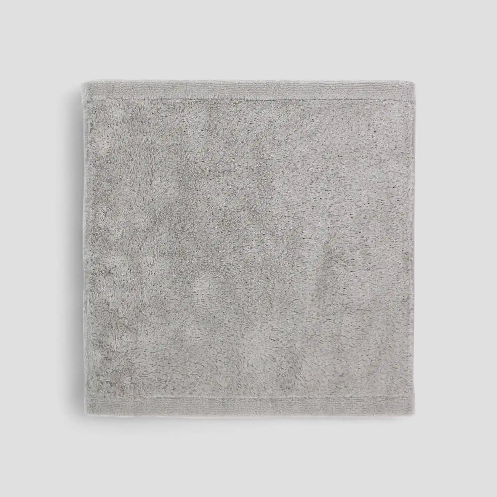 Gray Imabati towel on a light gray background