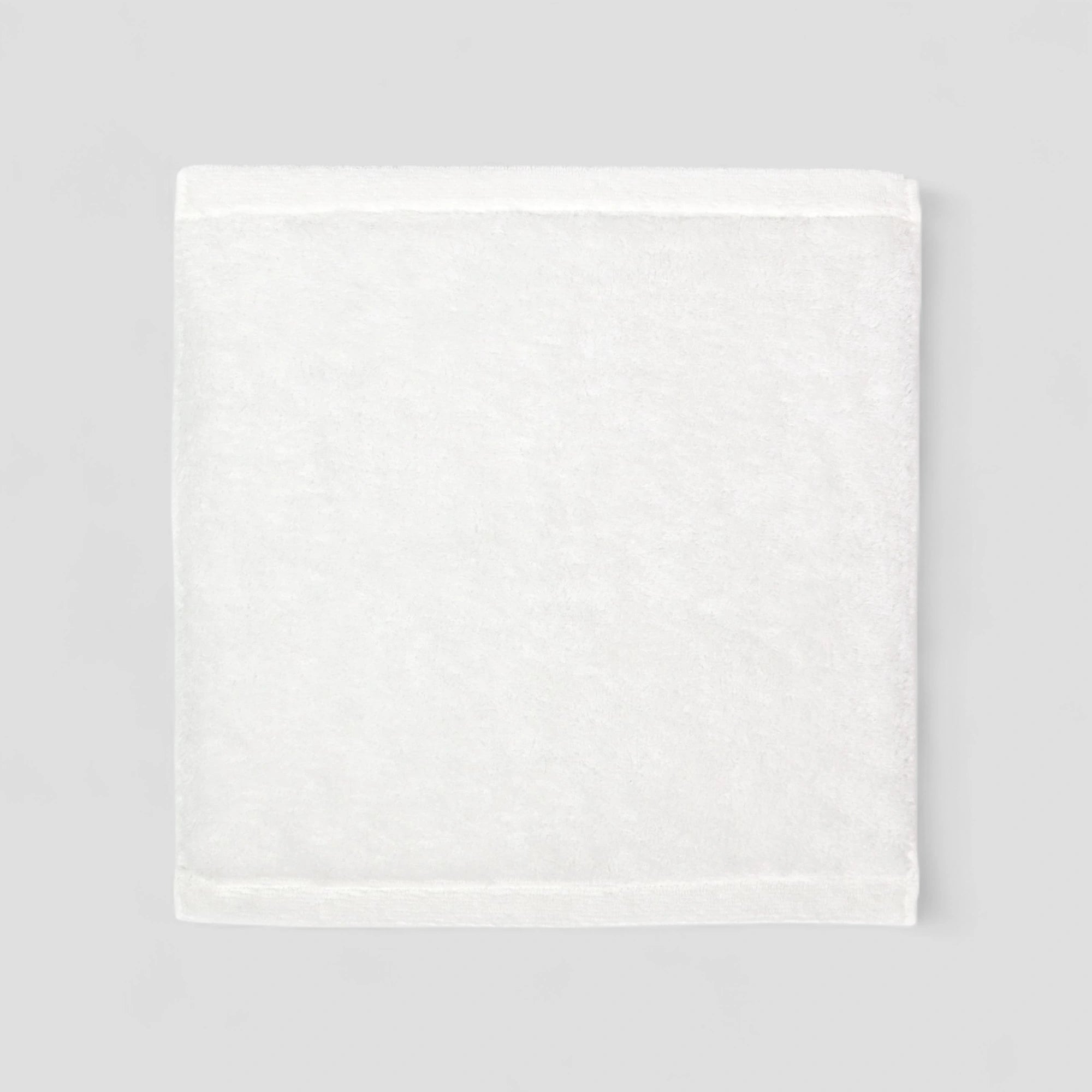 White Imabari towel on a light gray background