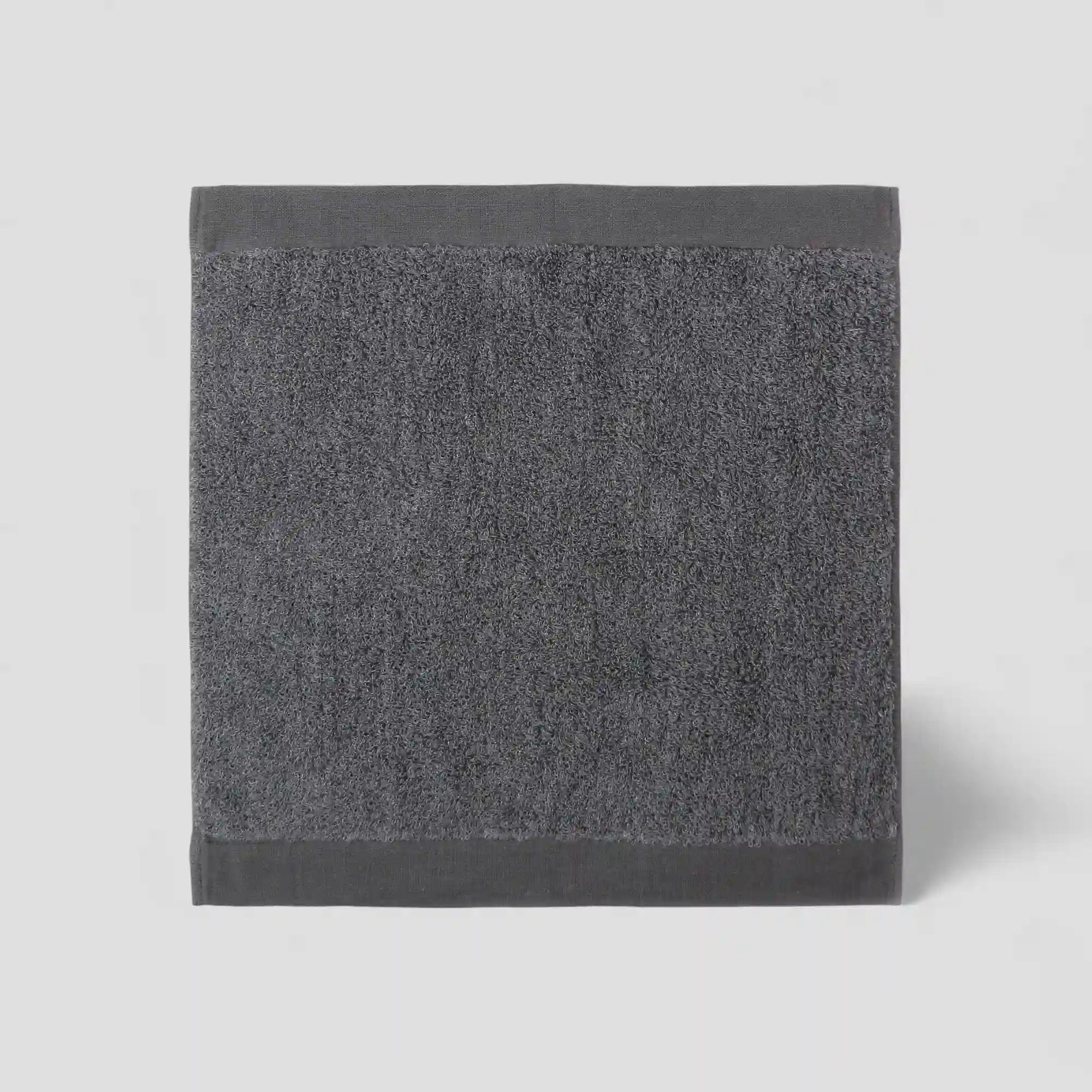 Gray Imabari towel on a light gray background