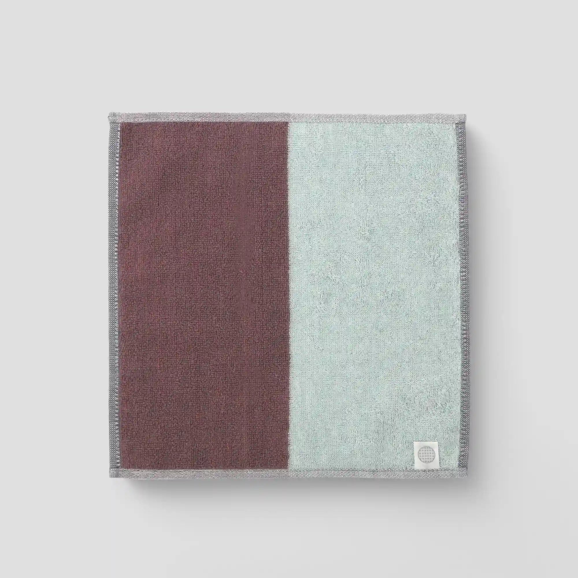 A collection of "tonari" Imabari towel in purple and gray backside with Iori&