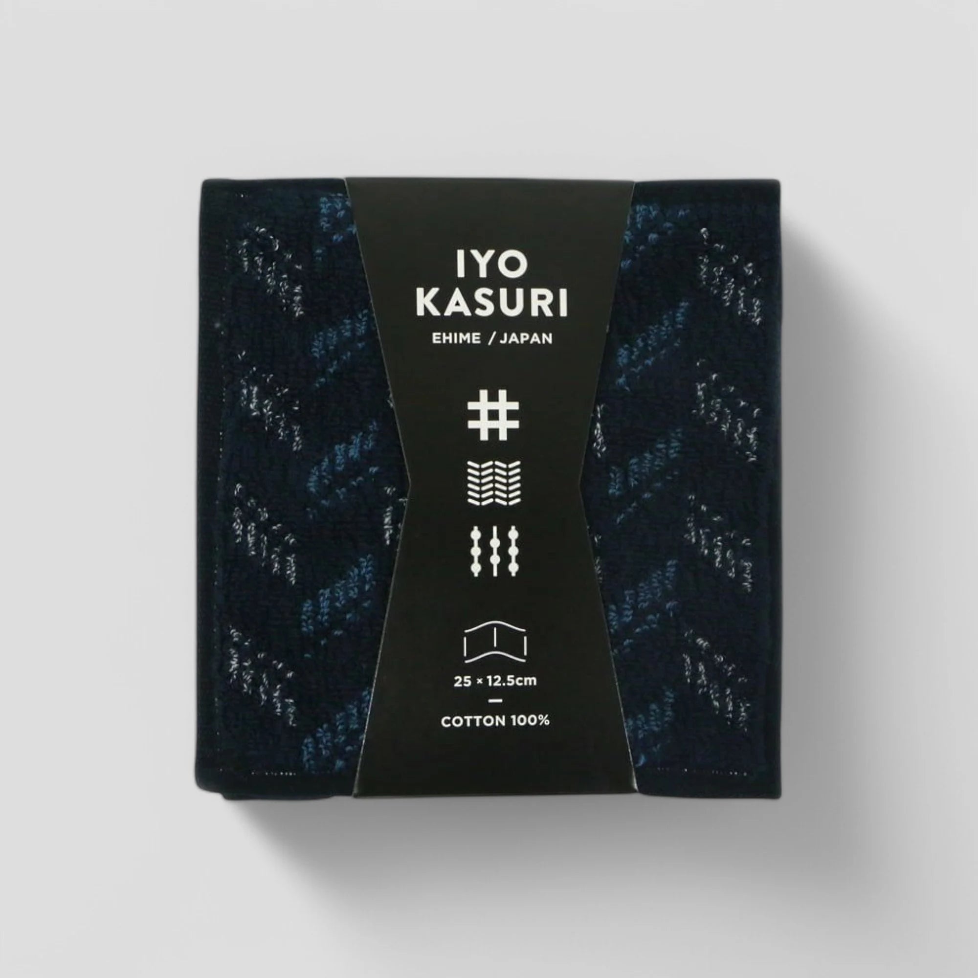 A square navy pattern Imabari towel with package of "IYOASURI"