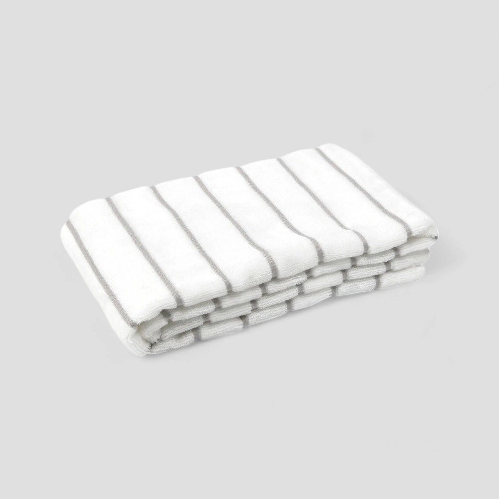 Folded white Imabari towel with gray stripe