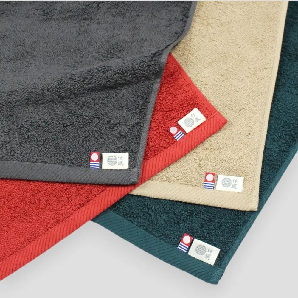 Close-up of labels Imabari towel brand mark and IORI&