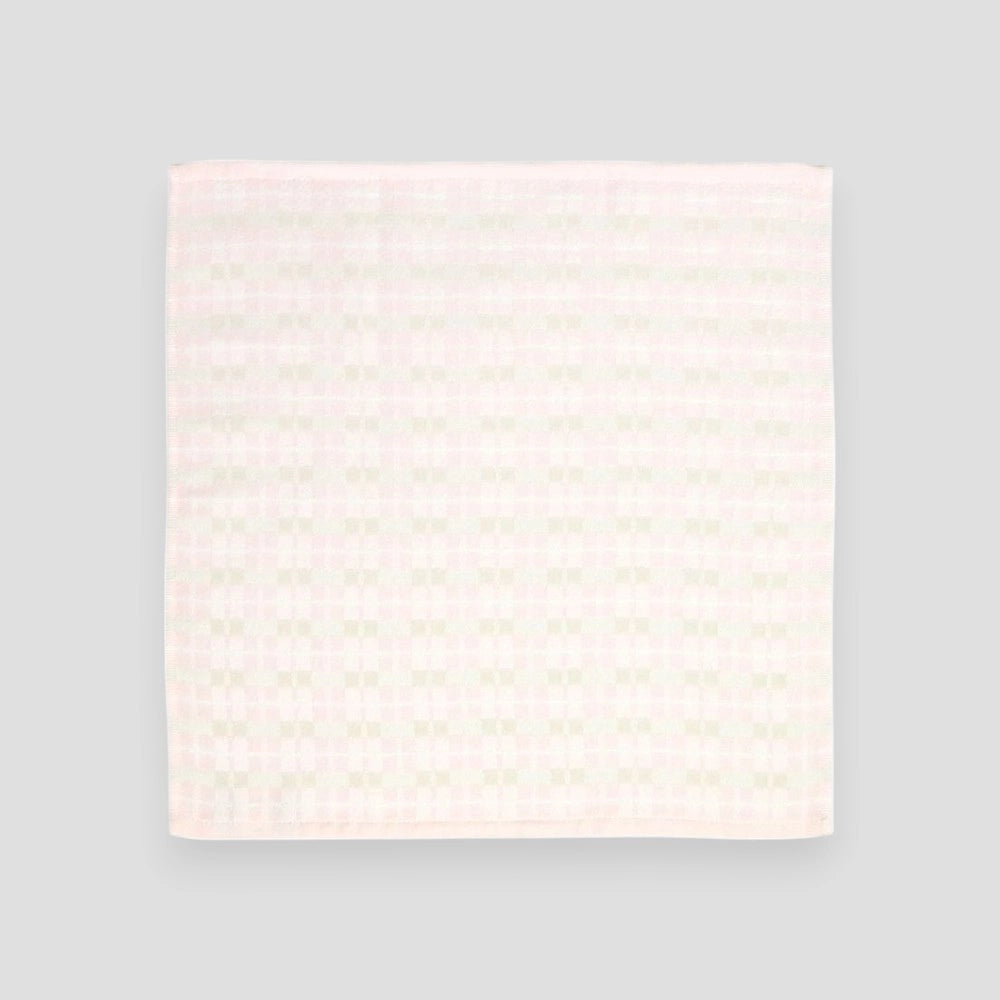 A square pink Imabari towel "enowa"  displayed against a white background, 