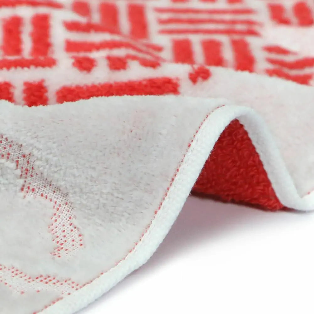 Close-up of a side with red pattern Imabari towel