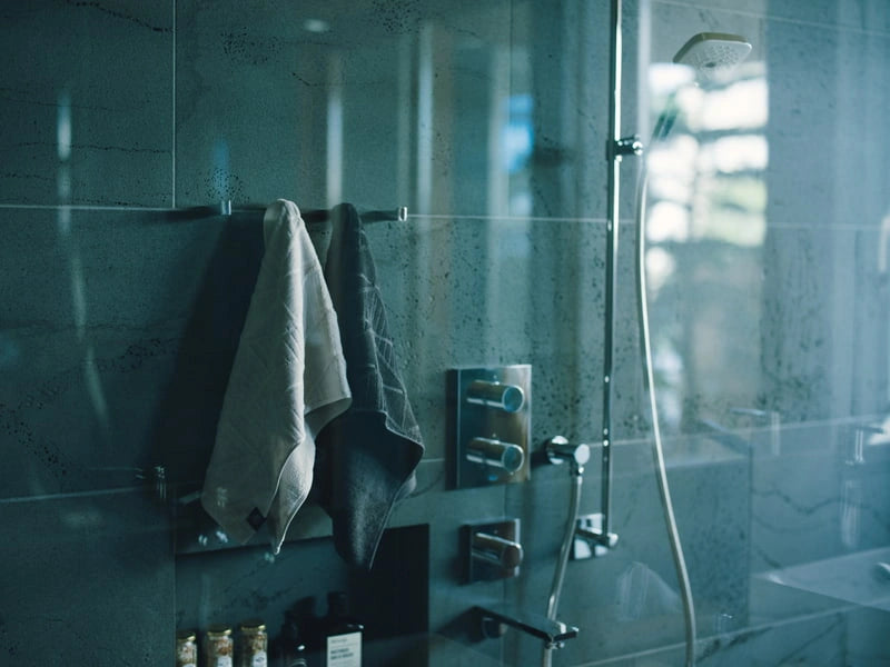 Hanging Imabari towels in a shower room