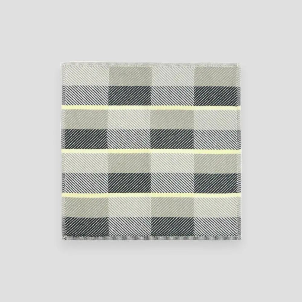 Small Imabari towels in black, navy, and gray displayed