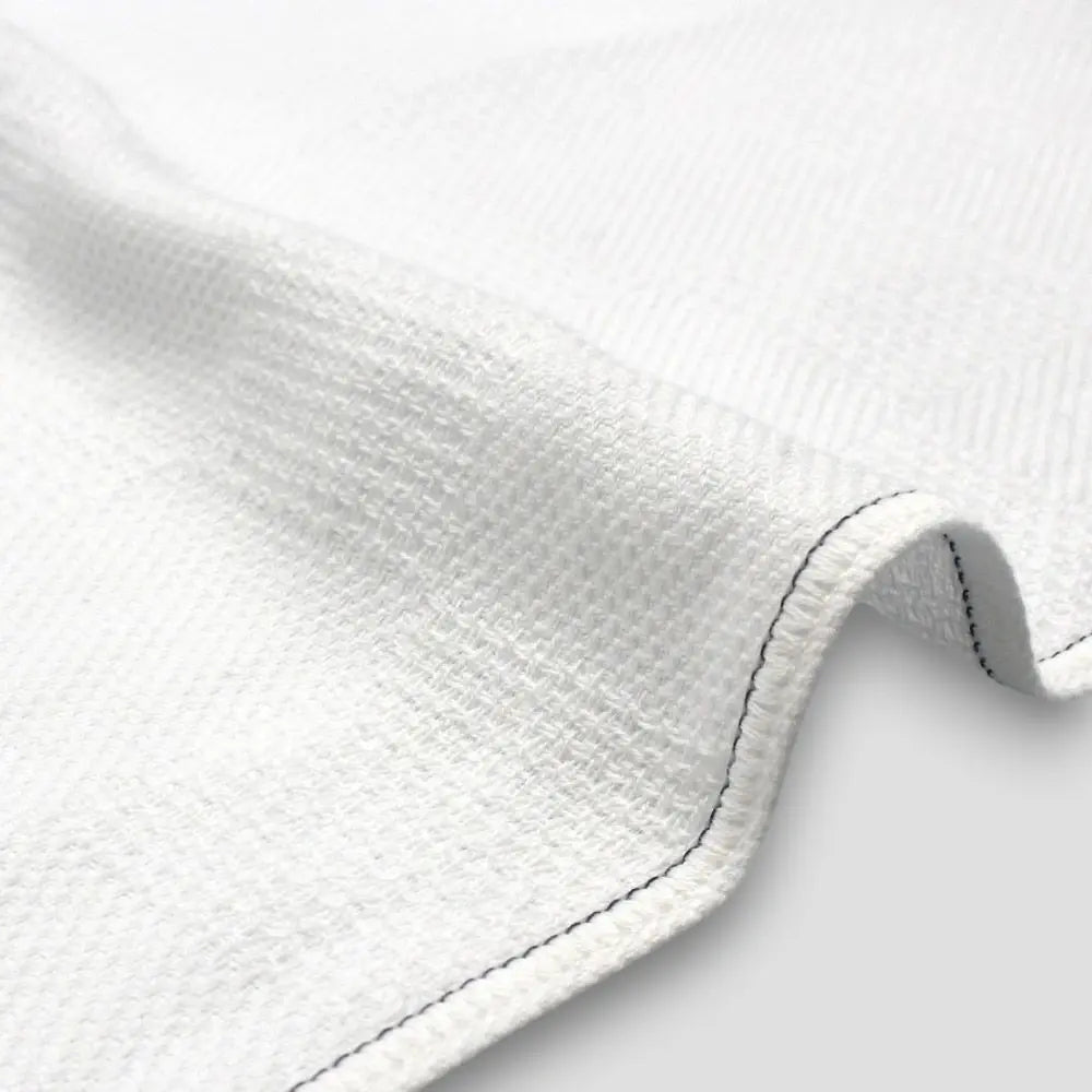 Close-up of a side of "Non-Pile" white Imabari towels 