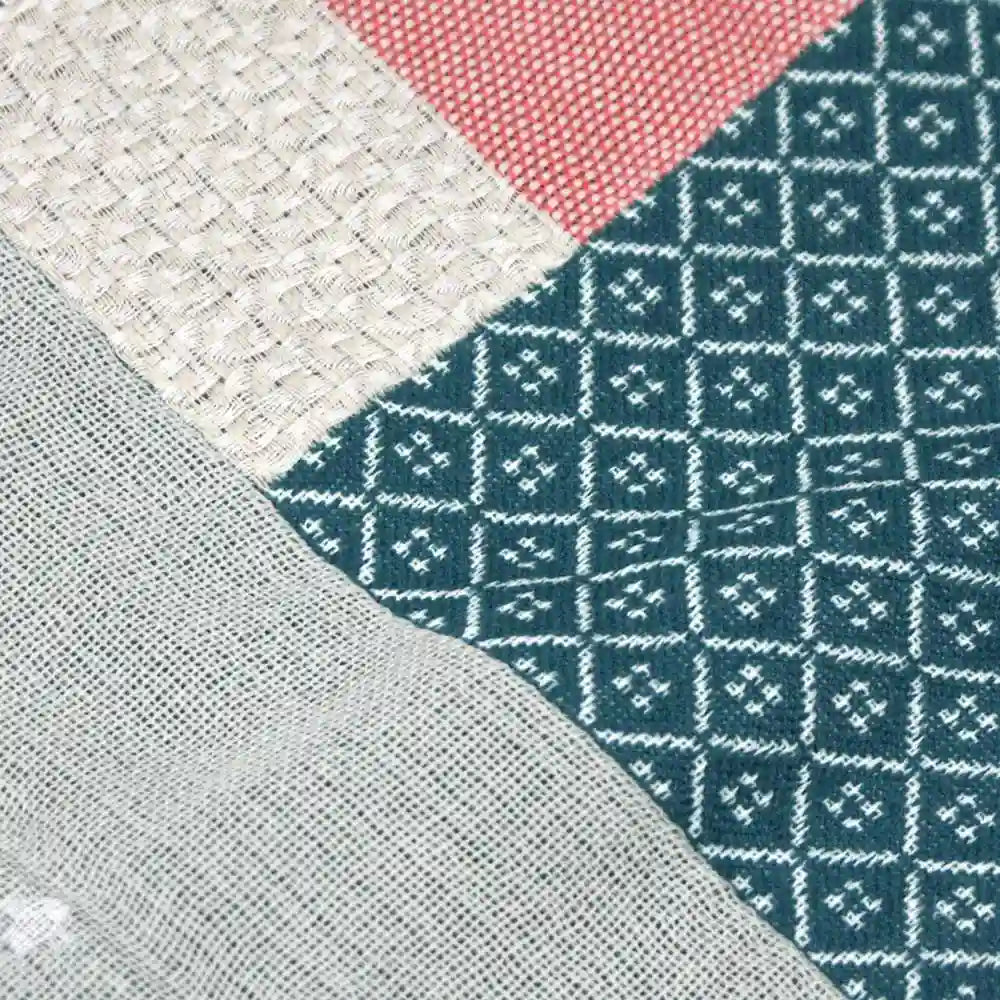 Close-up of the Texture of patchwork design Imabari towel fabric in navy and red colors