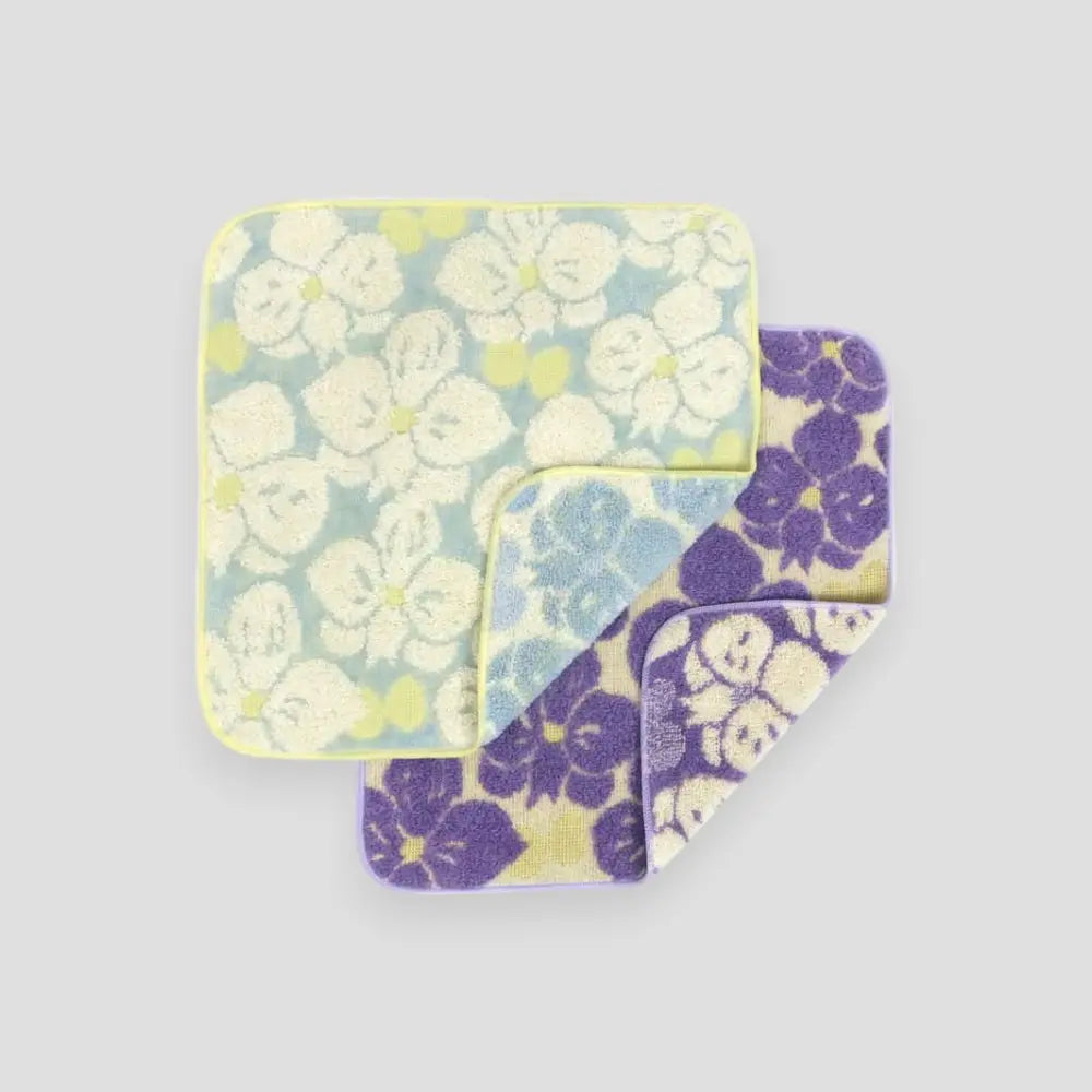 Two small Imabari towels with white and purple floral pattern