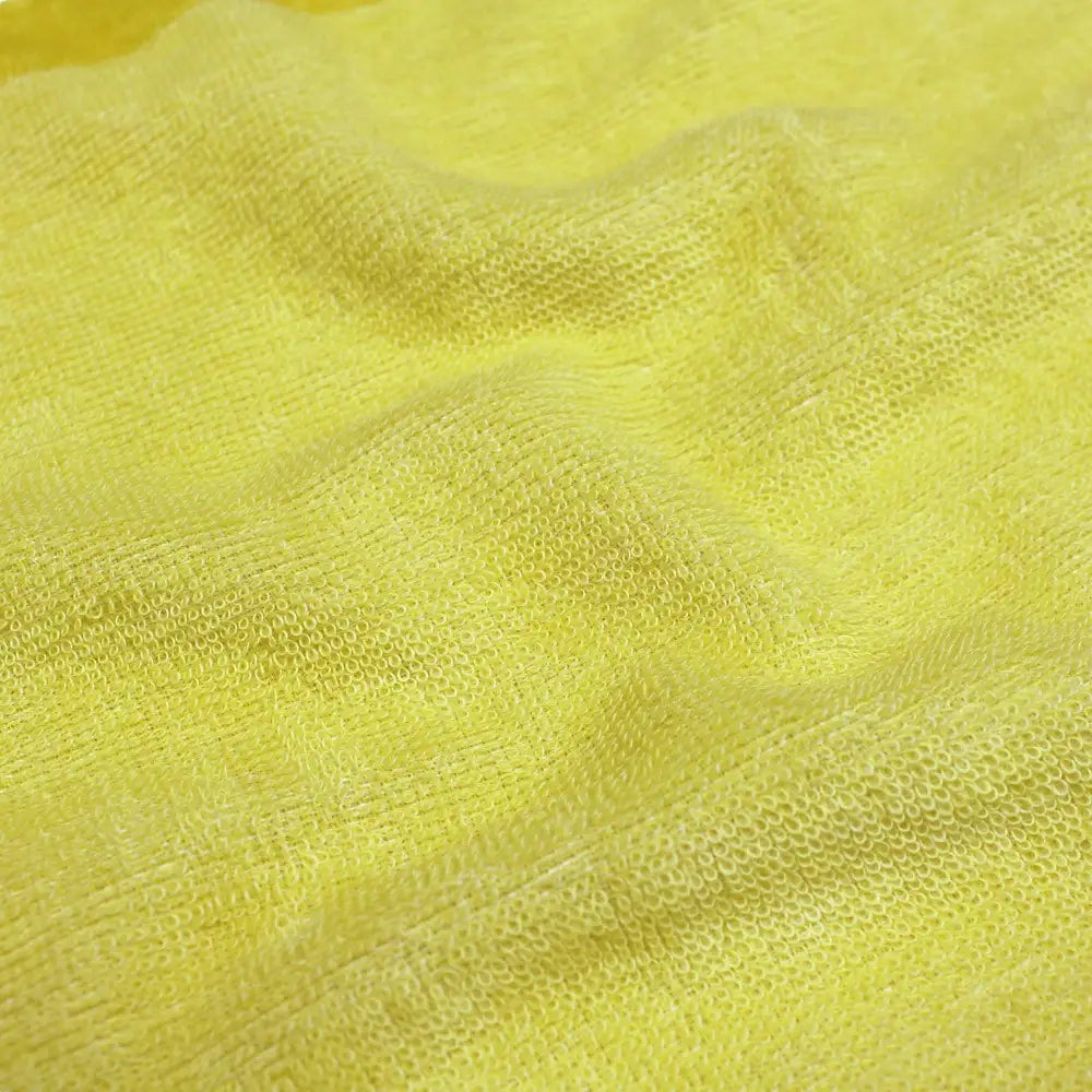 A close-up of the texture reversible yellow Imabari towel