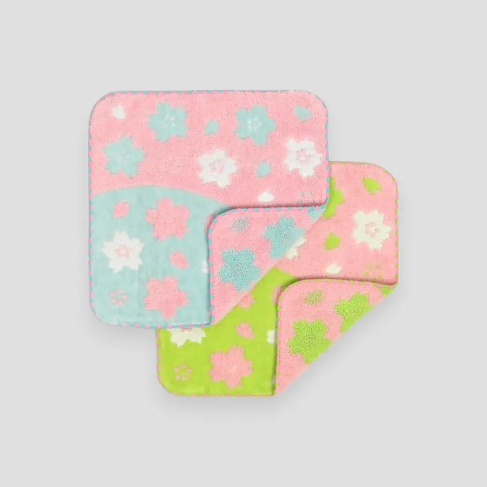 A set of Imabari square towels with blue, pink and green floral patterned