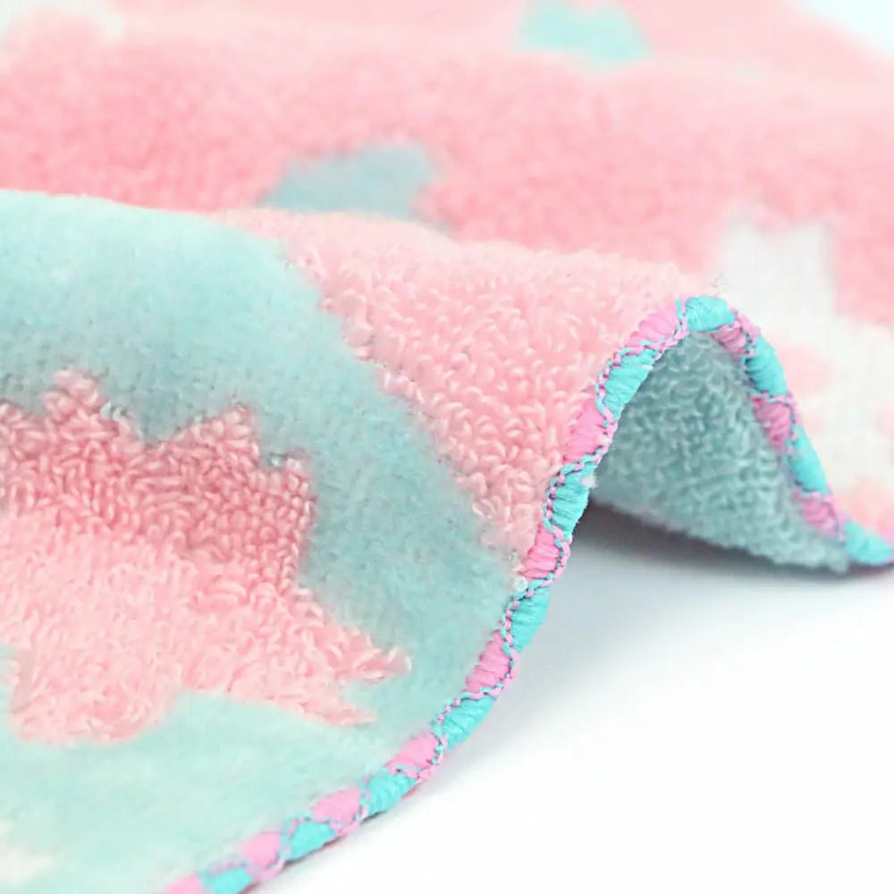 Close-up of a side of square pink and blue Imabari towel