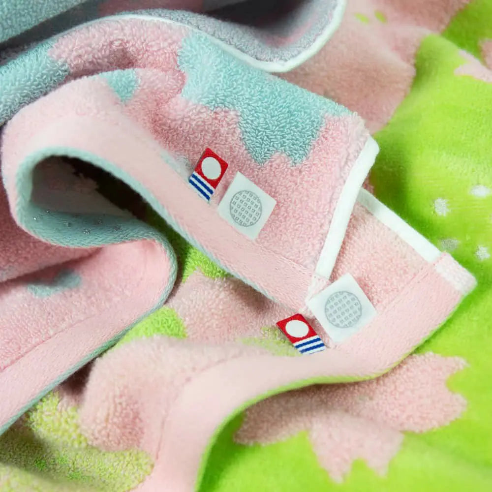 Close-up of Imabari towel labels with Imabari brand mark and IORI&