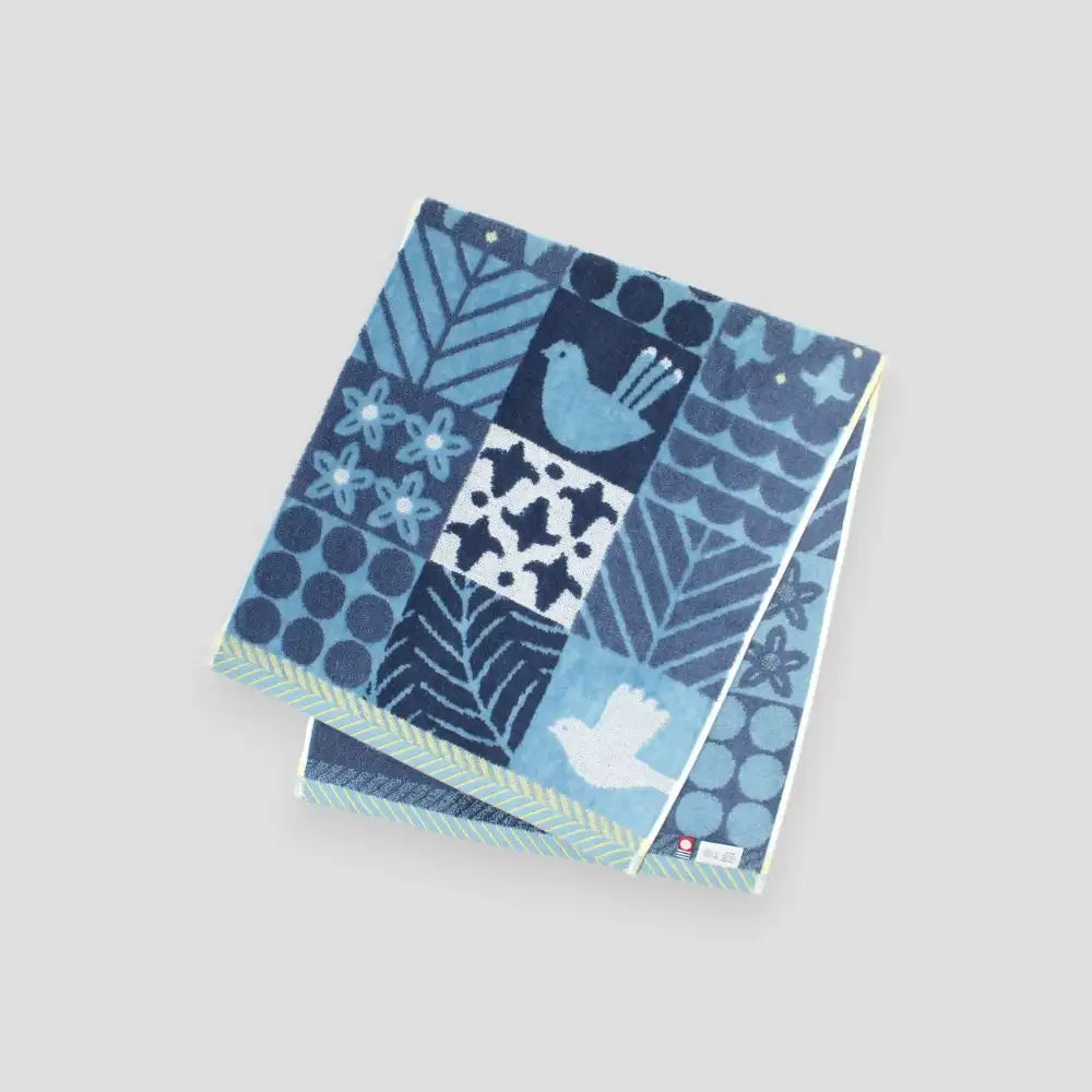 A blue  bird patterned Imabari towel 