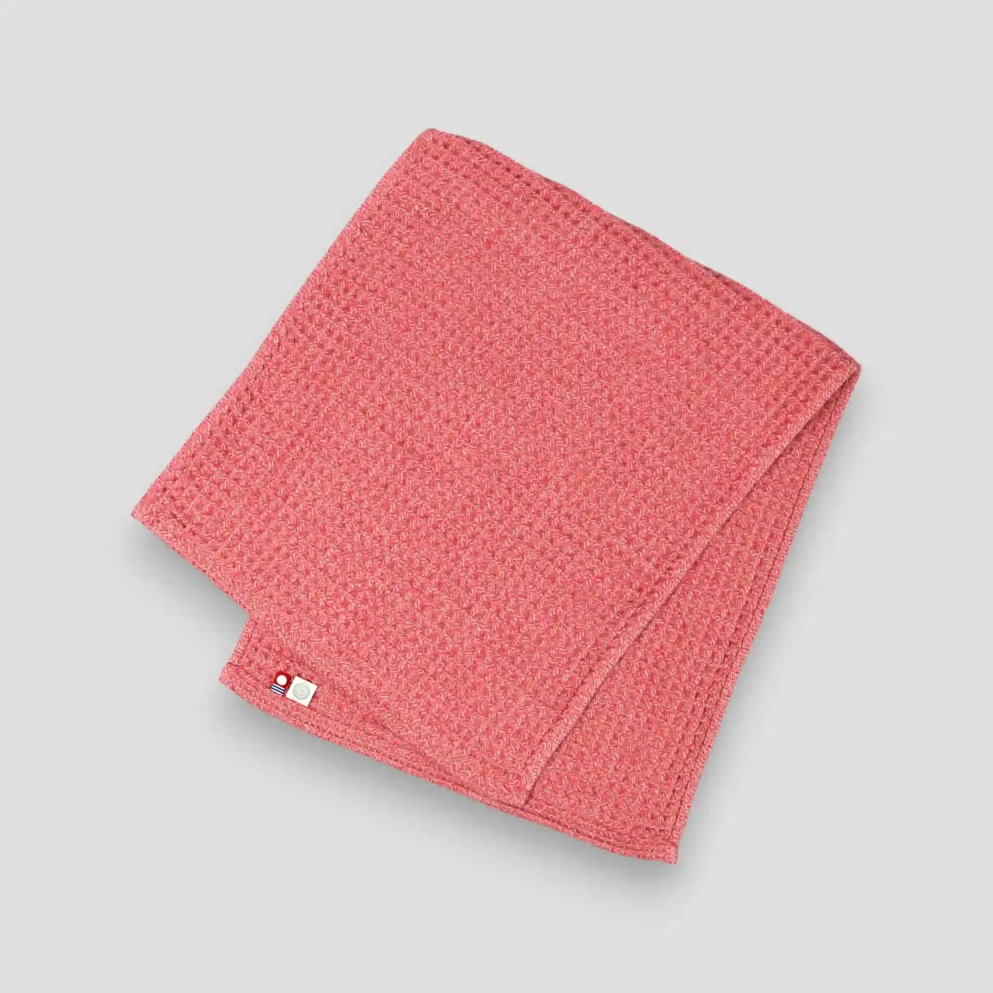 Red waffle Imabari towel on a gray background
