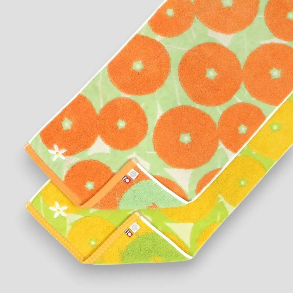 Colorful Imabari towels with labels of Imabari towel brand mark and IORI&