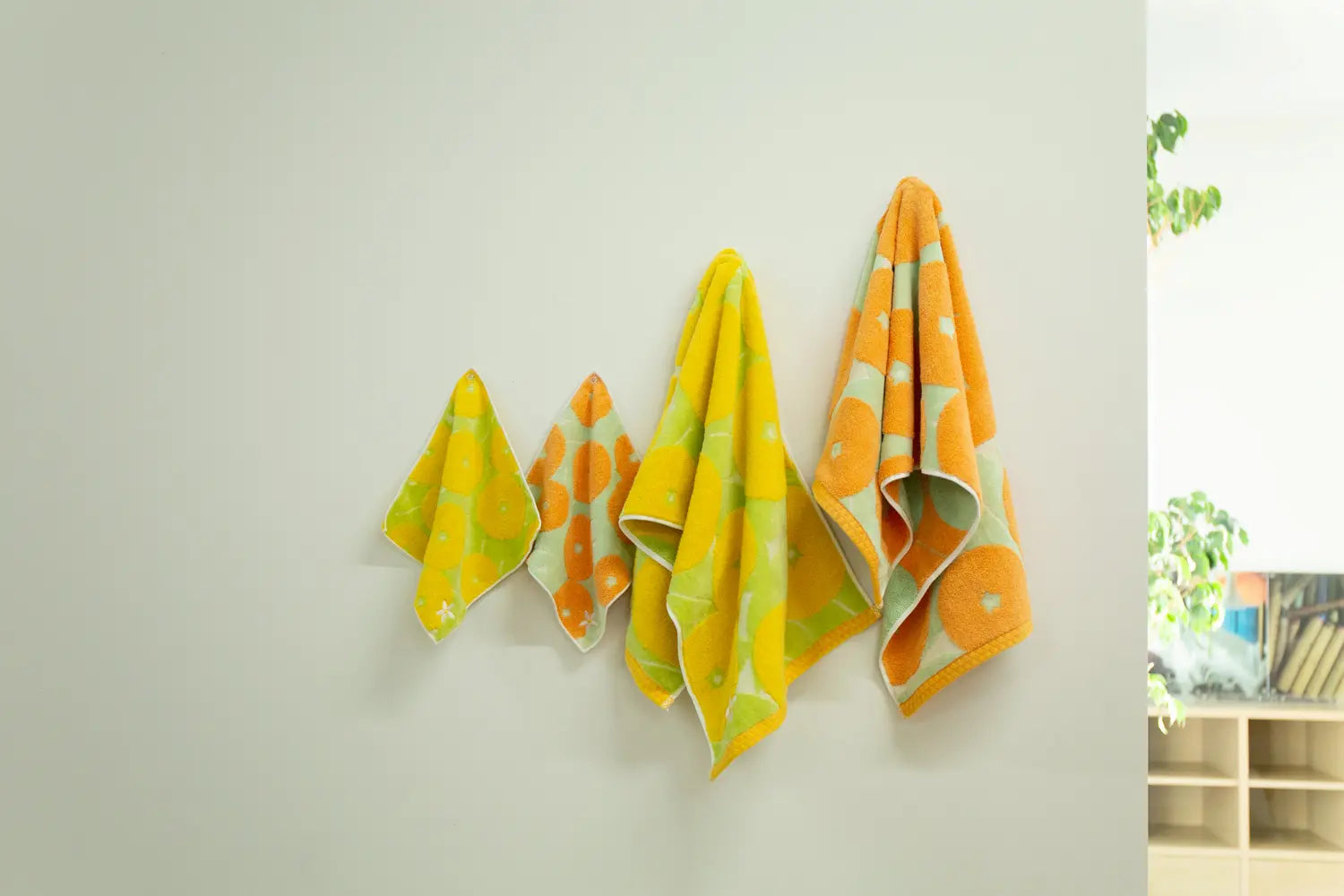 Colorful various size of Imabari towel hang the white wall