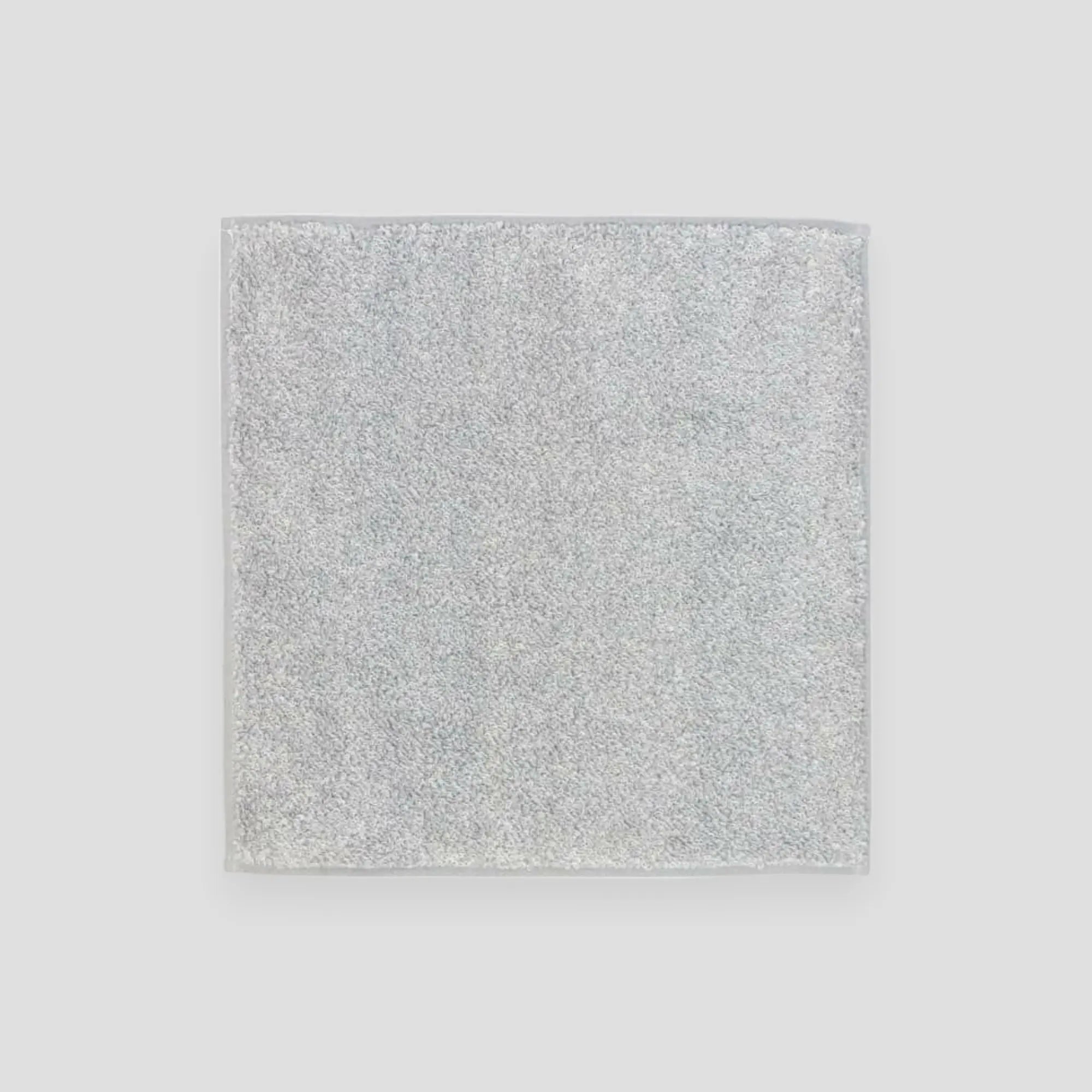 Square gray Imabari towel with light gray background.