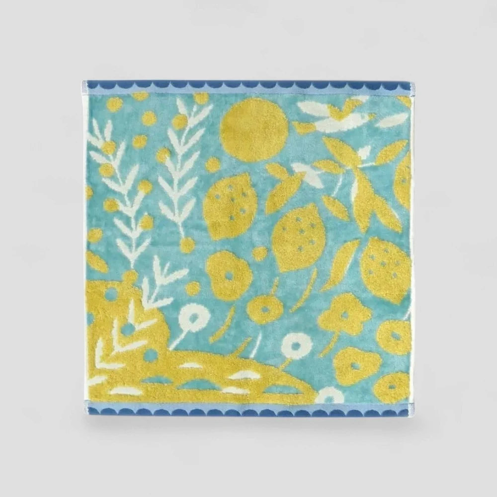 Imabari towel with multicolored patterns, including blur and yellow  tones, made from 100% cotton.