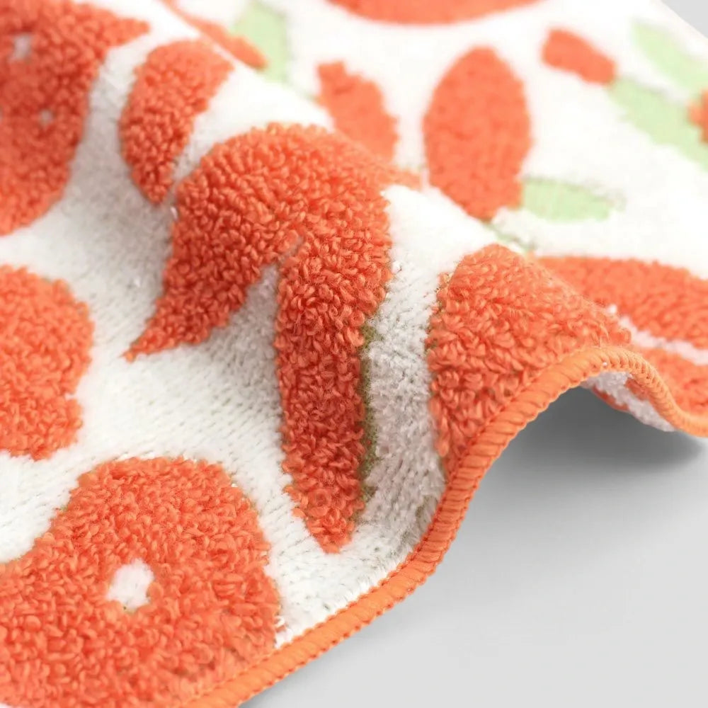 Close-up of a side Imabari towel with orange pattern