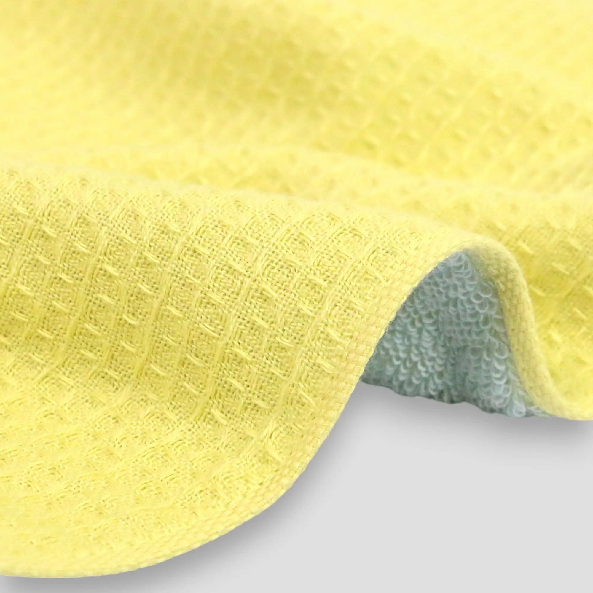 A close-up of the yellow Imabari towel&