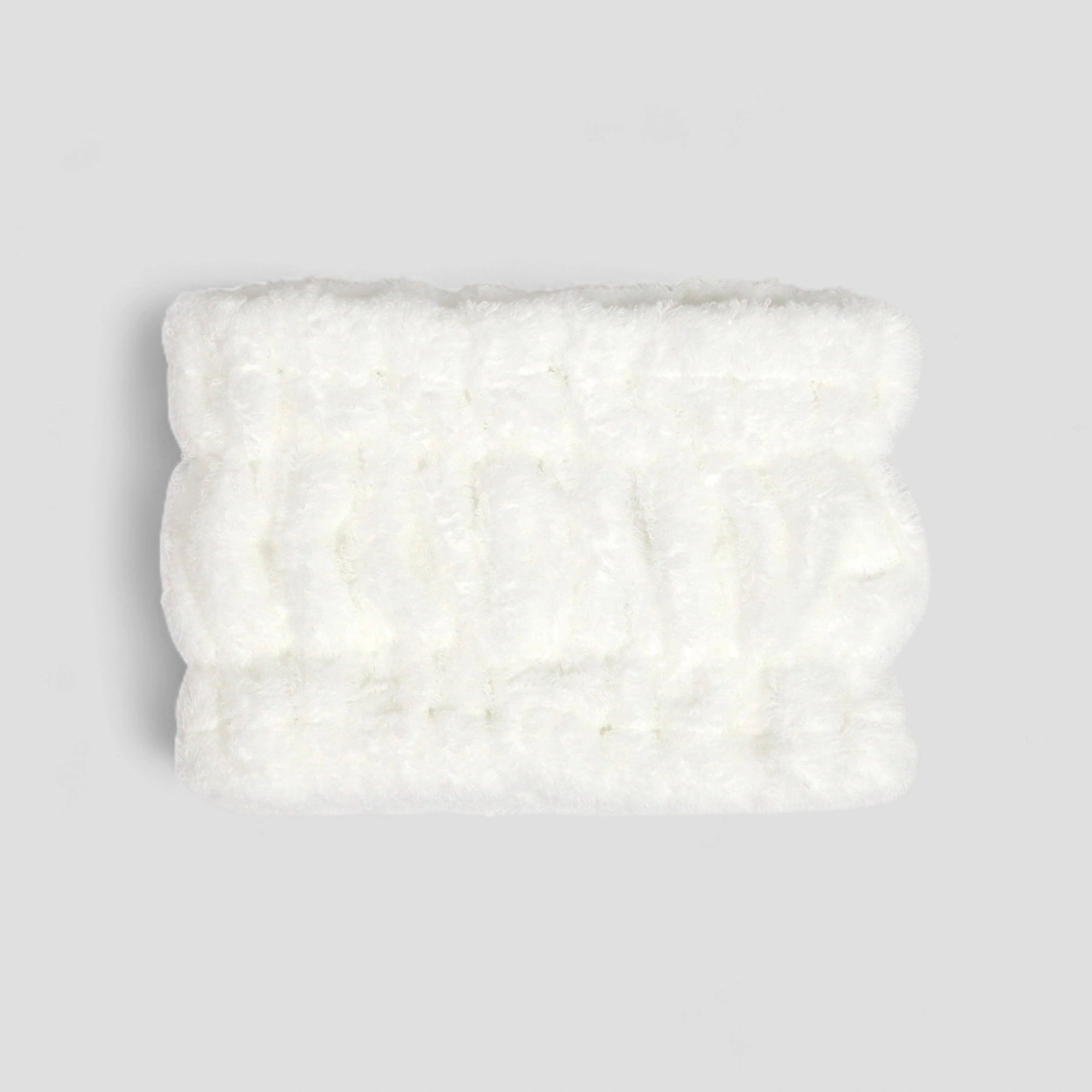 White Imabari towel head band textured fabric on a light gray background