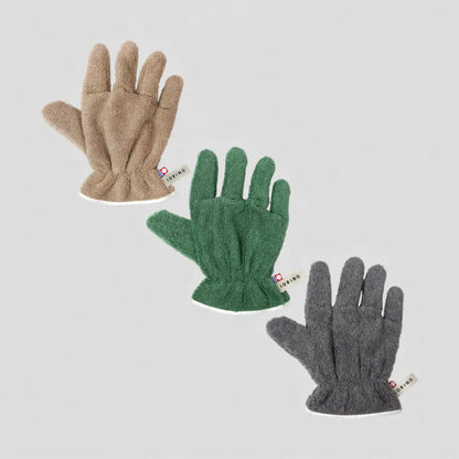 Three pairs of Imabari towel gloves for hair dry in beige, green, and gray on a light gray background.