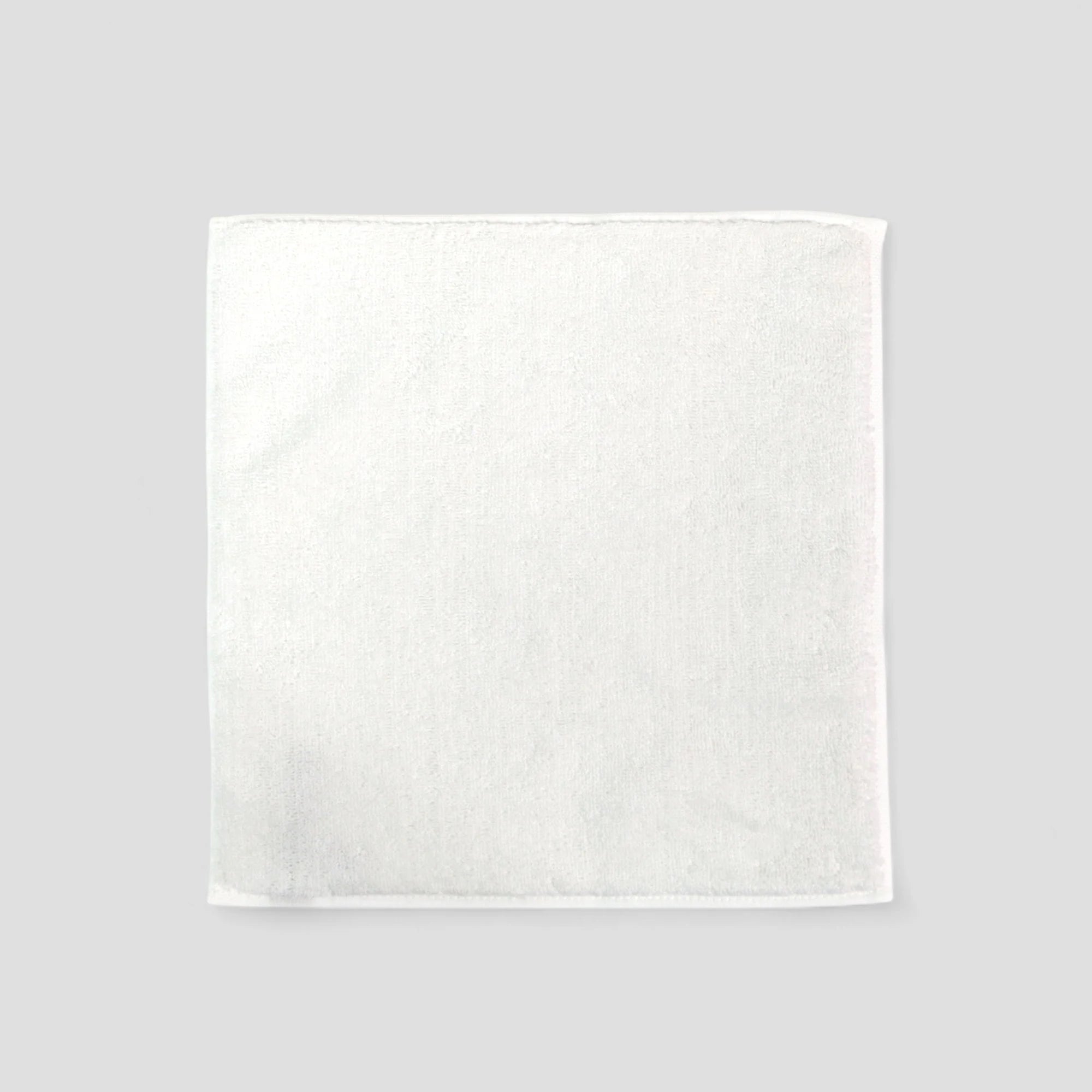 White square Imabari towel on a light gray background