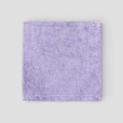 Purple Imabari towel on a light gray background