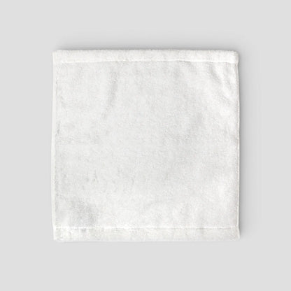 White textured Imabari towel on a light gray background